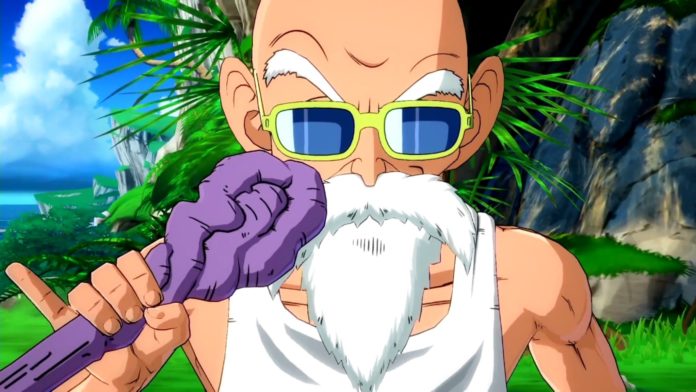 Le futur combattant additionnel de Dragon Ball FighterZ, Tortue Géniale, avec sa canne, levant le petit doigt de la main droite