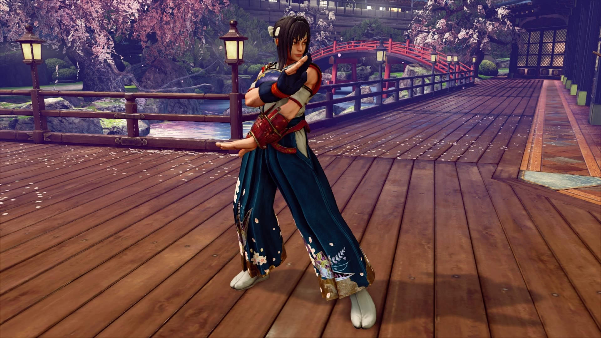 Karin dans Street Fighter V: Champion Edition portant le costume d'Hokuto