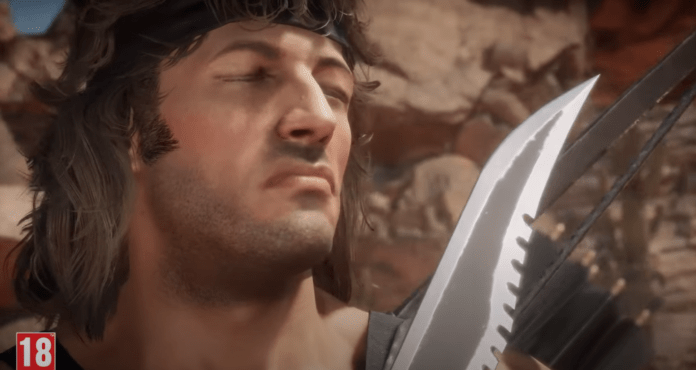 Le visage de John Rambo avec son couteau dans sa bande-annonce de Gameplay pour Mortal Kombat 11: Ultimate