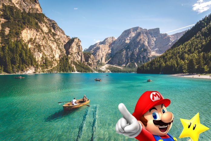 un lagon avec des bateaux dessus et Mario qui pointe du doigt avec une étoile